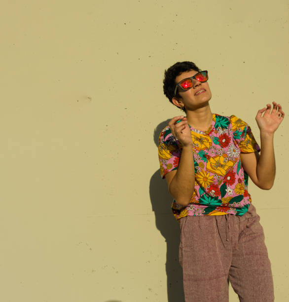 istock A hippie woman with short hair under sunlight 1402087826