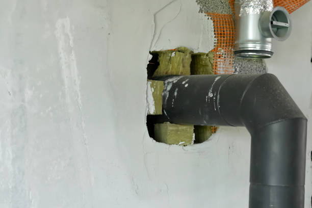 istock Chimney for the fireplace in private house. 1402091686