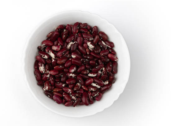istock red beans in ceramic bowl on white background, top view 1402091735