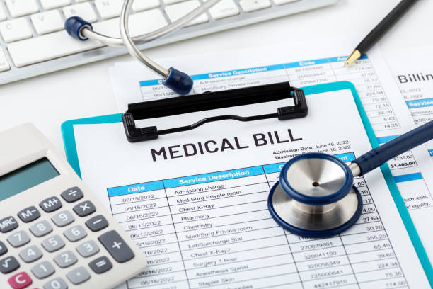istock Medical bill concept with calculator and stethoscope 1402094439