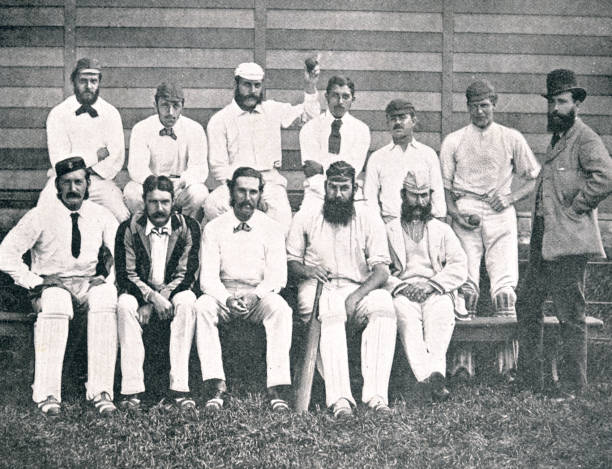W G Grace Cricketer with Gloucestershire Team with cup after winning William Gilbert Grace an English amateur cricketer, important in the development of the sport and is widely considered one of its greatest players. 

He played from 1865 to 1908, during which he captained England, Gloucestershire, the Gentlemen, Marylebone Cricket Club, the United South of England Eleven.

Right-handed as both batsman and bowler, Grace dominated the sport during his career. An outstanding all-rounder, 

He was particularly admired for his mastery of all strokes. He generally captained the teams he played for at all levels because of his skill and tactical acumen.

He qualified as a medical practitioner in 1879. cricket team stock illustrations