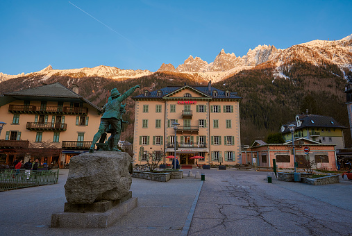 France, Chamonix Mont-Blanc - April 10, 2022: A landscape of Chamonix-Mont-Blanc town at sunset with Mont-Blanc mountain and the Alps in the background, France