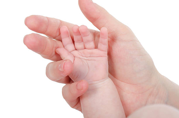 istock Mum holds  hand of the child 140209895