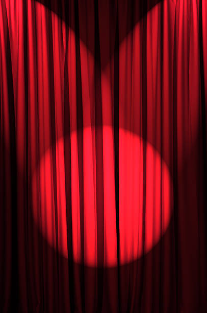 istock Brightly lit curtains in theatre concept 140210104