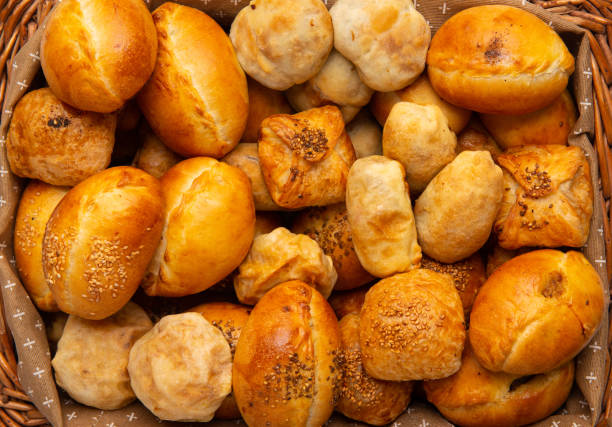 istock Top view shot of different type of breads in a basket 1402101696