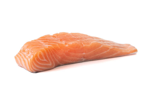 istock Raw slice of salmon isolated on white background 1402102592