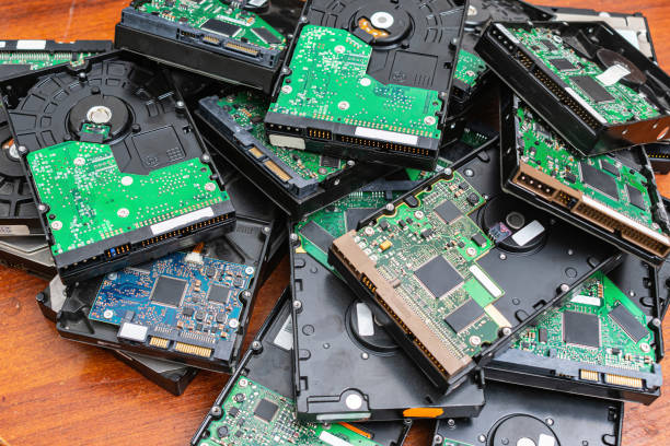 istock Obsolete hard drives piled up for recycling 1402102831