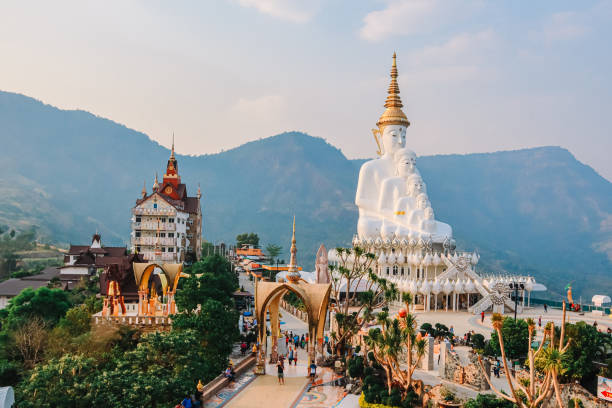 istock Wat Phra That Pha Son Kaew, Temple in Thailand,Buddha statue with many faces 1402103122