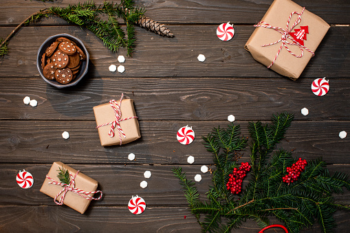 Decorated homemade Christmas gingerbread cookies on a rustic background