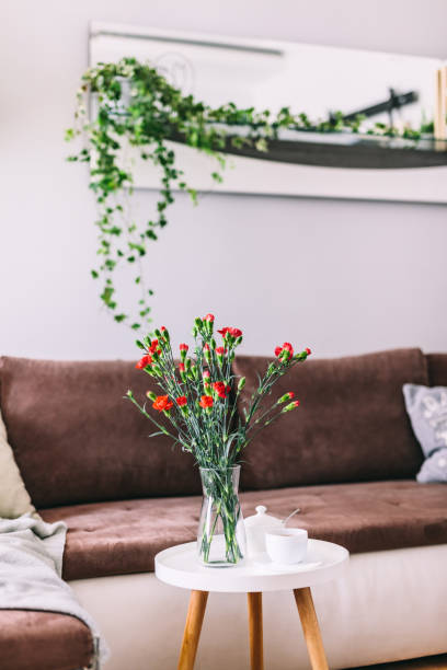 istock Coffee table in a small cozy apartment. 1402111007