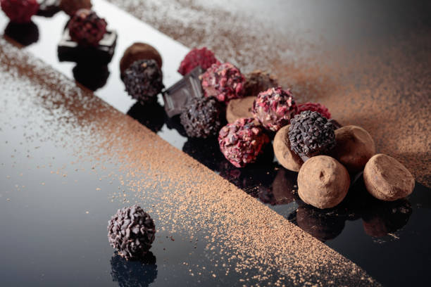 istock Various chocolate sprinkled with cocoa powder. 1402113563