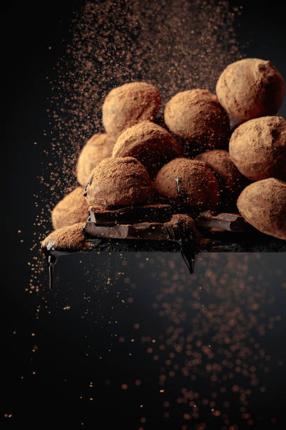 istock Chocolate truffles sprinkled with cocoa powder. 1402113564