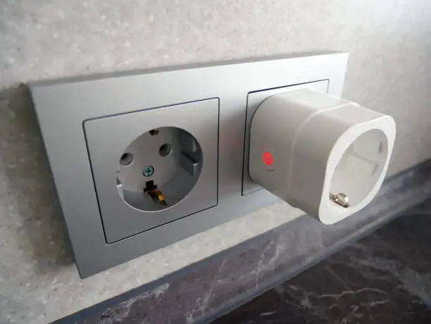 Smart socket in the interior of the house. Smart socket for controlling smart home devices