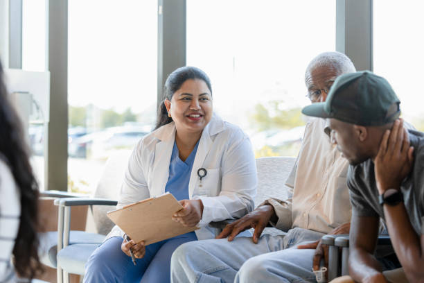 istock Doctor talks to her patient's son 1402121915