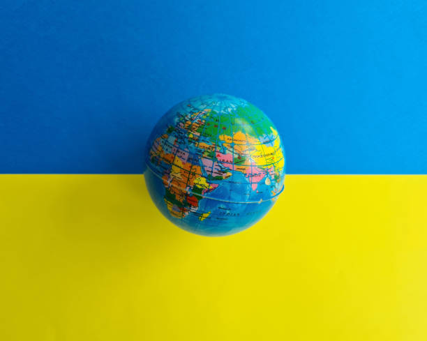 istock World globe on background of Ukrainian flag 1402122977