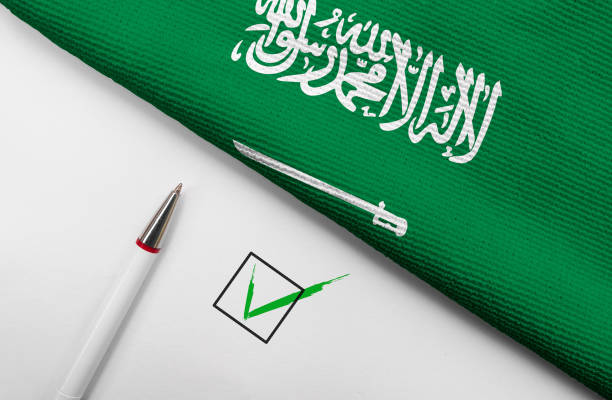 istock Flag of Saudi Arabia and check mark 1402126669