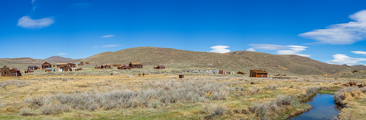 Bodie, California is a town frozen in time, and preserved by California State Parks in a state of “arrested decay.” Bodie became a State Historic Park in 1962, and maintains the buildings just as they were found when the State took over the town – but they do not restore the buildings, instead choosing to simply preserve the buildings in their aged and weathered 1880s appearance.