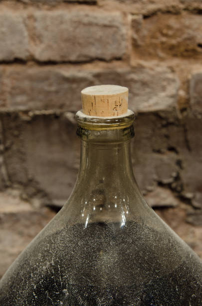 istock Big bottle in a cellar with aged alcohol. 1402128925