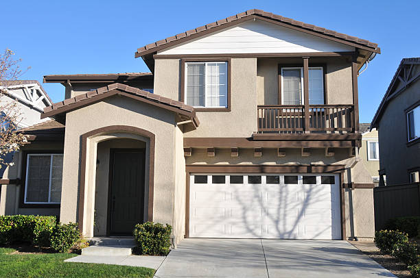 istock Two story single family house with driveway 140212936