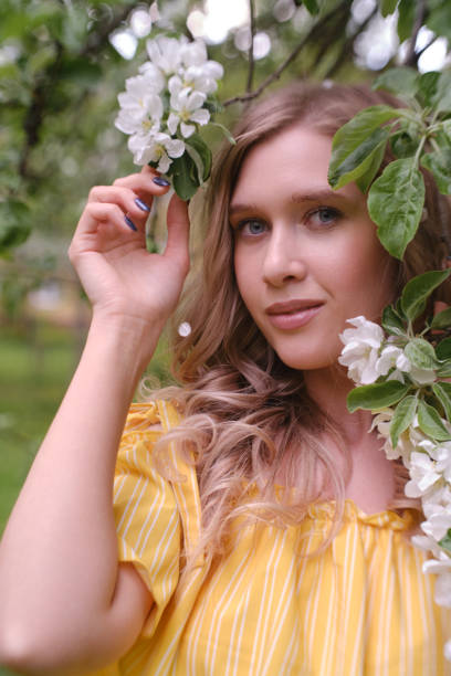 istock woman in flowers 1402130622