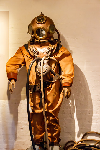 Old diving suit, bronze helmet and diving apparatus