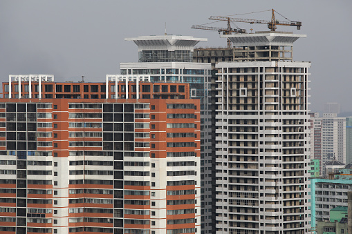Apartment construction and cranes in North Korea