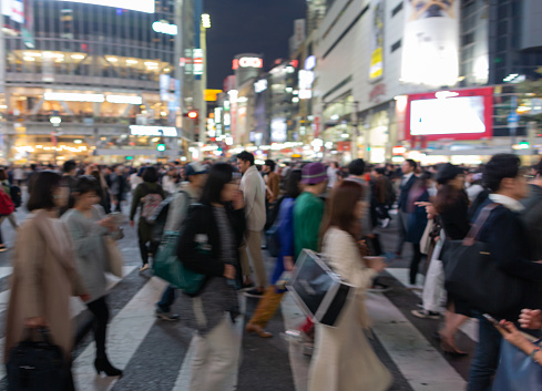 Shibuya Crossing in Tokyo, Japan. The most famous intersection in the world. Blurry because of the panning.