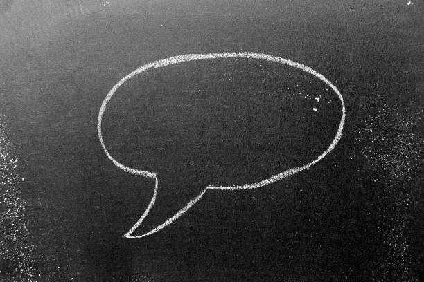 istock White color chalk hand drawing in round bubble speech shape with blank space on blackboard or chalkboard background 1402140525