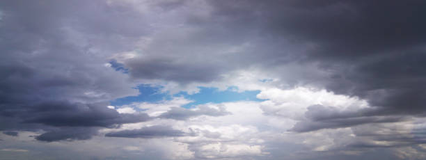 istock Thunderstorm. Wide blurred background. Dramatic sky, clouds. The Sun Always Shines Again.Dark epic sky. beauty of earth 1402141945