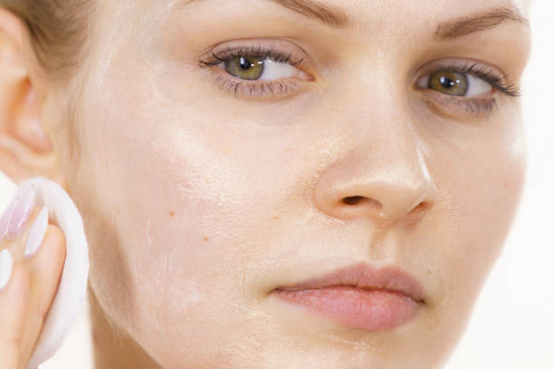 istock Girl removes mask cosmetic 1402149195
