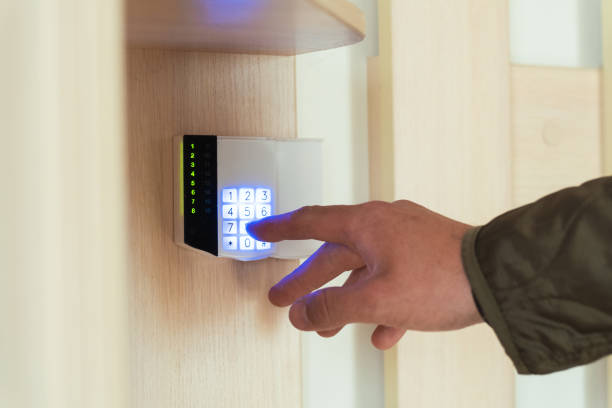 istock Numpad of remote control panel of the security system in the apartment. entering password to activate modern alarm system. 1402149580