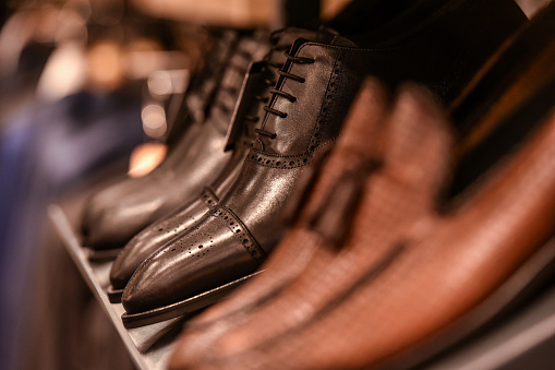 men's shoes in the shop shelf