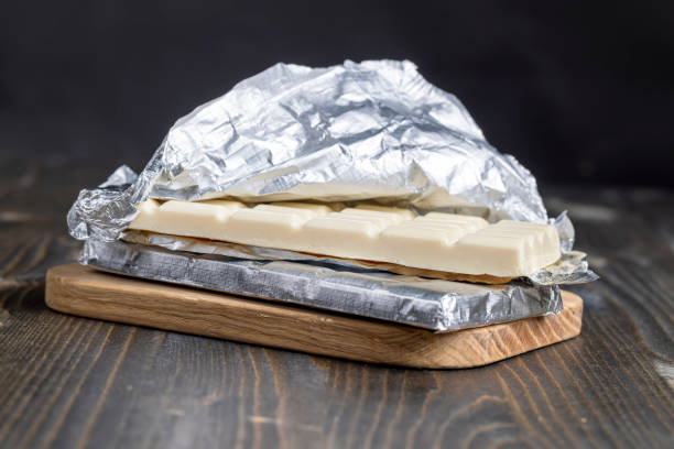 istock white porous chocolate on a wooden table 1402156173