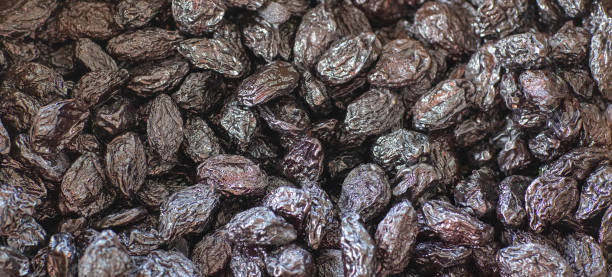 istock background of dry prunes, top view 1402162447
