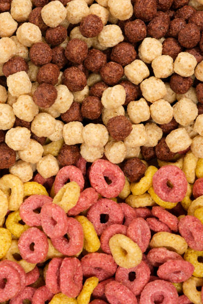 istock A set of different quick breakfast cereals - rings and balls, top view on white. 1402164181