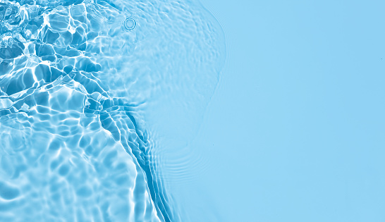 Textura de fondo abstracta azul con ondas de agua y ondas photo