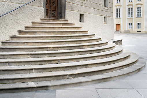 Old stone granite stairway, semi-circular historic steps