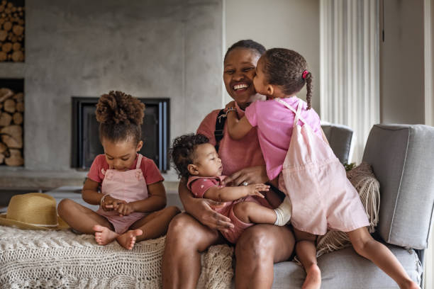 istock Multi races family in home 1402167773