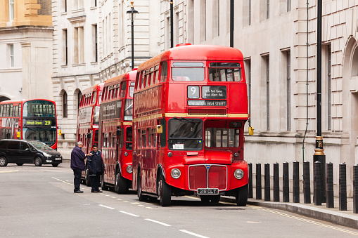 LONDON, UK - OCT 28, 2012: Iconic red AEC Routemaster  double-decker buses parked on a street in Central London