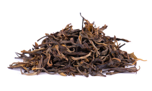 istock Red tea isolated on white background. Chinese organic tea. Close up. 1402178167