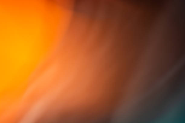 istock Abstraction of orange light in the dark. Smooth gradient. Horizontal banner 1402181984
