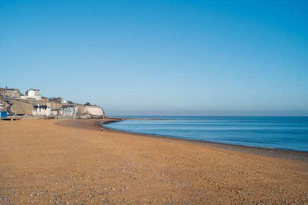istock Ramsgate main sands beach in winter on a bight day with a blue sky. 1402182845