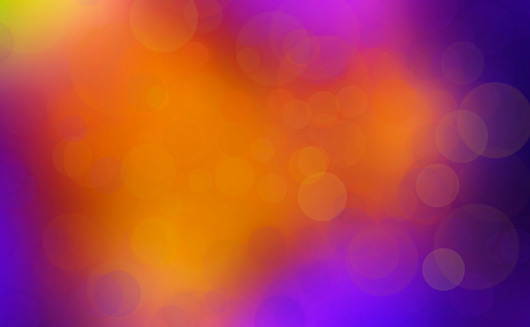 Defocused cityscape at night light background. Orange and blue pink