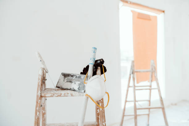 istock ladders and tools on white room at construction site. Painting walls. Home improvement, renovation 1402187160