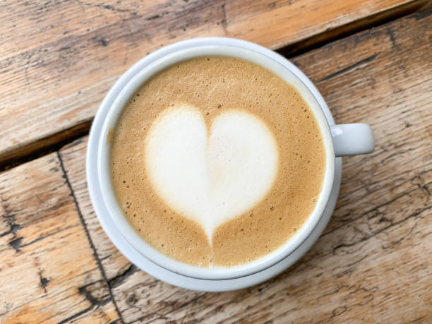 istock A cup of coffee latte On a wooden table 1402189326