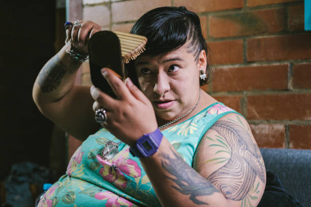 istock woman putting on makeup 1402190564