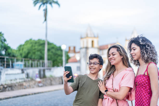 istock Tourist family taking selfie 1402191749