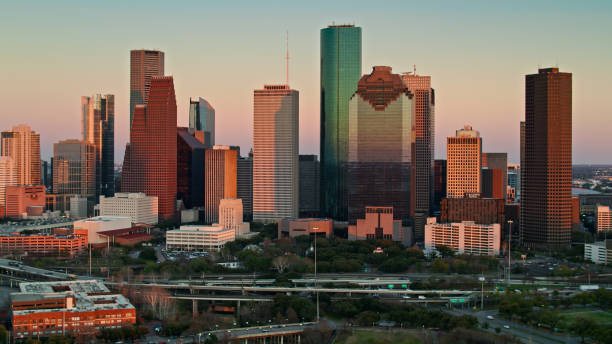istock Pink Evening Light on Downtown Skyscrapers in Houston - Aerial 1402197001