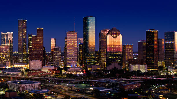 drone shot of downtown houston, texas at night - houston-texas bildbanksfoton och bilder