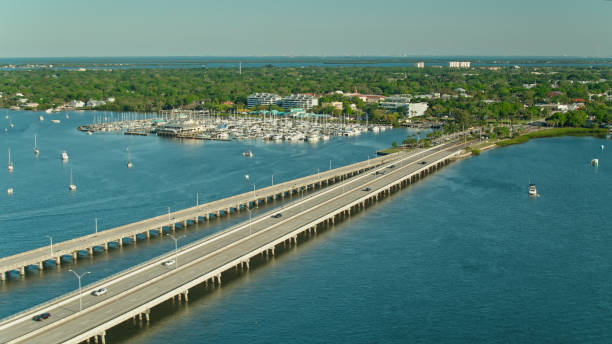 Aerial shot of the bridge leading into Palmetto, a small city in Manatee County, Florida on a sunny day.